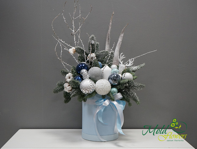 Blue Christmas Box with a Tree and Decorations photo